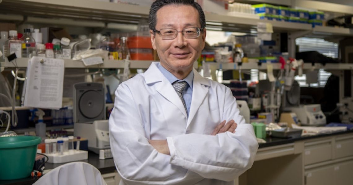 Photo of researcher Rong Li in his lab. 