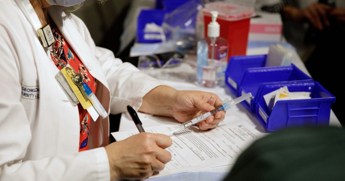 vaccination form being filled out