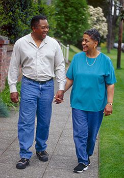 Husband and wife walking down the street
