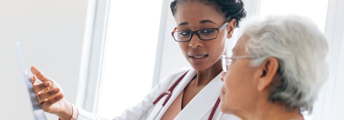 Doctor explaining something to patient