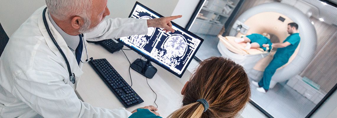 Doctor pointing to monitor