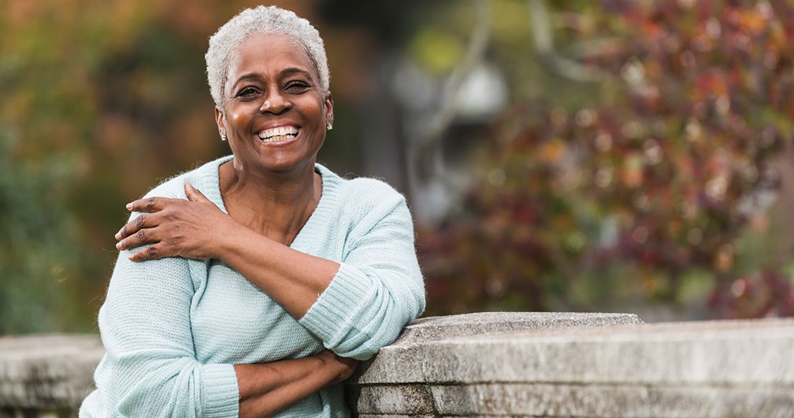 woman smiling in the park