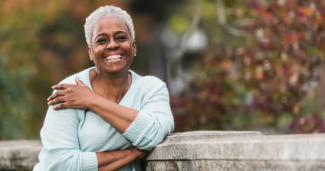 woman smiling in the park